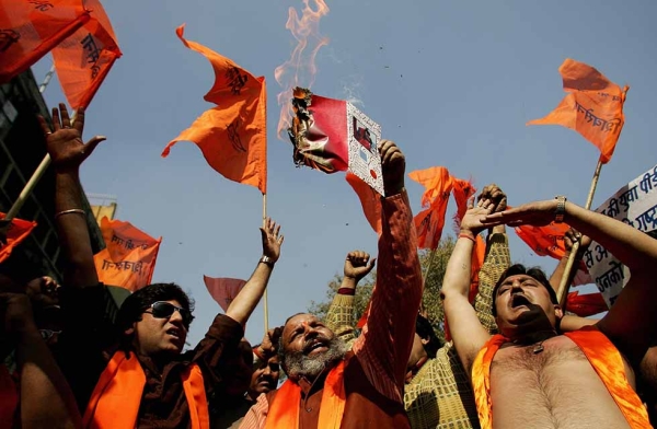 Activists of Indian right-wing Hindu party Shiv Sena shout slogans and burn greeting cards during an anti-Valentine's Day protest in New Delhi on February 14, 2008. The Shiv Sena annually burn cards and even threaten shopkeepers selling such products. (Manan Vatsyayana/AFP/Getty)