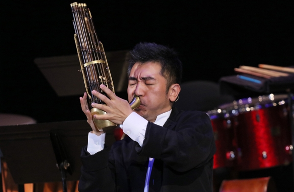 Grammy Award winning artist Wu Tong performs the U.S. premiere of his new chamber piece, “Water Way,” using the traditional Chinese instrument called the sheng at Asia Society New York on February 28, 2017. (Asia Society/Ellen Wallop)