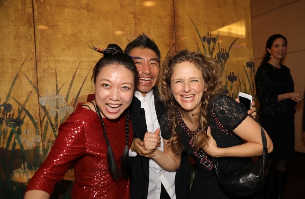 (L-R) Musicians Wu Fei, Wu Tong, and Abigail Washburn mingle after their performance at Asia Society New York on February 28, 2017. (Asia Society/Ellen Wallop)