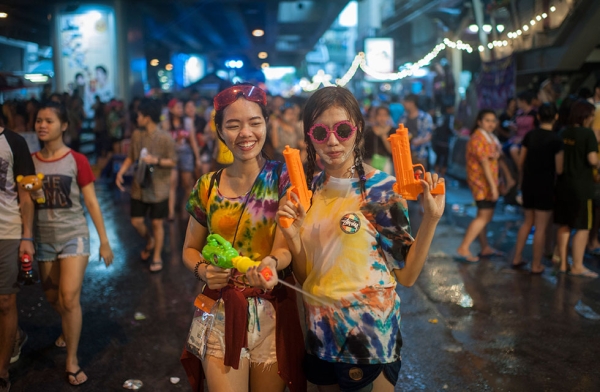 Revellers take part in a water fight during the Songkran water festival in Silom road on April 13, 2015 in Bangkok, Thailand. (Borja Sanchez-Trillo/Getty Images)
