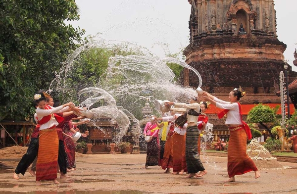 Celebrants are pictured at a temple in Chiangmai, Thailand splashing water on each other for celebration on May 2, 2010. (Hwannaa/Getty Images)
