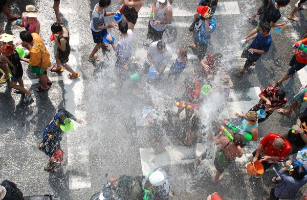 People throughout Thailand crowd the streets with overflowing buckets and water pistols on April 15, 2011, in Bangkok, Thailand. (CatEdwards1/Getty Images)