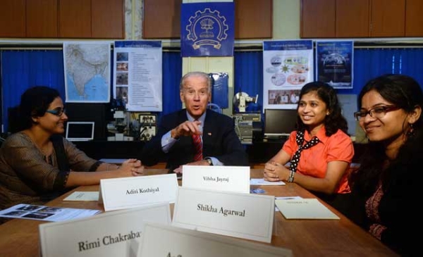 U.S. Vice President Joe Biden (C) interacts with students during a visit to the Indian Institute of Technology (IIT) in Mumbai on July 25, 2013. (Indranil Mukherjee/AFP/Getty Images) 