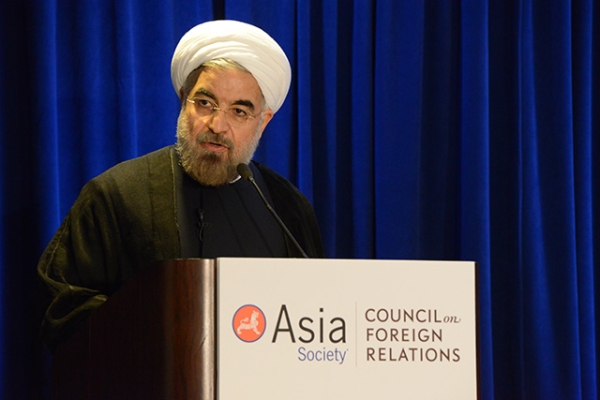 Iranian President Hassan Rouhani delivers remarks at the Hilton Hotel in New York City on September 26, 2013. (Kenji Takigami/Asia Society)