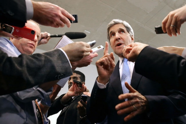 U.S. Secretary of State John Kerry speaks with reporters at the U.S. Capitol before testifying to the Senate Banking and Urban Affairs Committee in Washington, DC on Nov. 13, 2013. (Chip Somodevilla/Getty Images) 