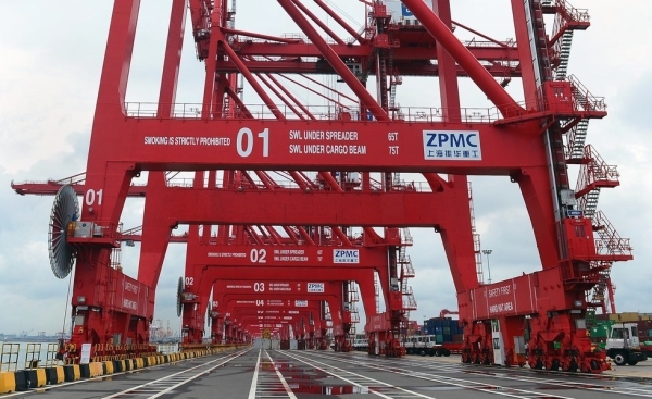 This photo taken on September 10, 2014 shows gantry cranes lined up at the new Chinese-majority owned Colombo International Container Terminal (CICT) in Colombo. China's president kicked off his first South Asia tour with a visit to Beijing's latest investment in Sri Lanka, a US$1.4 billion port city development to include a marina and a Formula One track, all just 250 kilometres (150 miles) from India's coast.