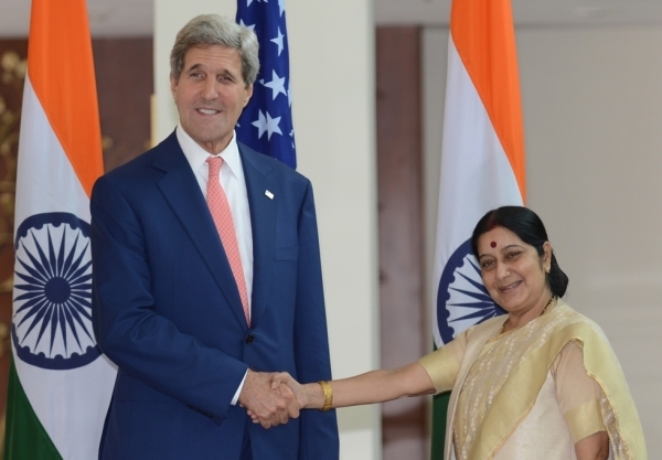 U.S. Secretary of State John Kerry (L) shakes hands with Indian Minister for External Affairs Sushma Swaraj during a meeting in New Delhi July 31, 2014. (Raveendran/Getty Images)