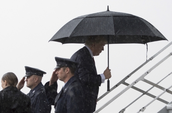 U.S. President Donald Trump departs for his two-day summit meeting with Xi Jinping on Air Force One. (Jim Watson/AFP/Getty Images)