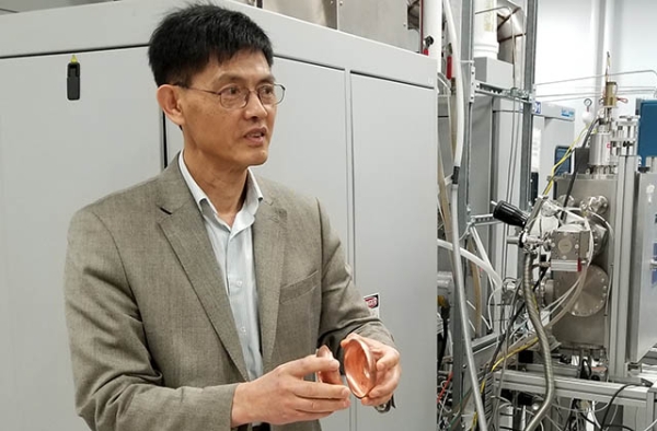 Xiaoxing Xi stands in his lab. (Xiaoxing Xi)