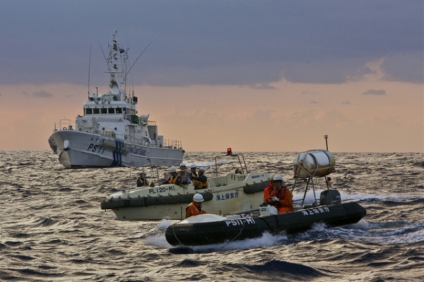 A Japanese flotilla from Japan's coast guard is vigilant in defending the waters off the Senkaku/Diaoyu islands. (Al Jazeera English/Flickr)