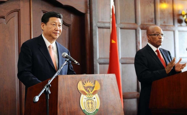 South African President Jacob Zuma (R) receives Xi Jinping (L) for a state visit at the Union Buildings on March 26, 2013.  (Stringer/AFP/Getty Images)