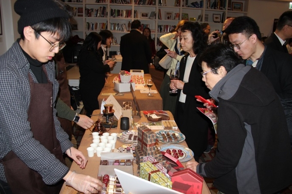 Members and guests try the offering from local chocolatiers and bakers.