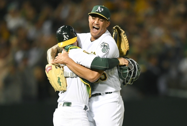 Sean Manaea celebrates after throwing a no-hitter against the Boston Red Sox.