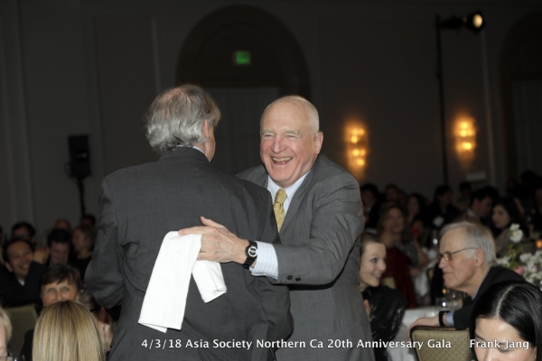 Asia Society Chief Financial Officer and Senior Vice President Don Nagle (left) and ASNC Advisory Board Co-Chair, Jack Wadsworth (right) share an embrace (Frank Jang/Asia Society)