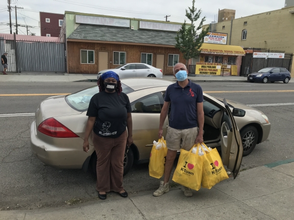 Asian Americans For Housing gives masks to K-town restaurant owners
