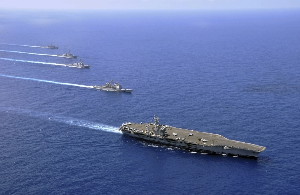The aircraft carrier USS Nimitz (CVN-68), the guided-missile cruiser USS Chosin (CG-65), the guided-missile destroyers USS Sampson (DDG-102) and USS Pinckney (DDG-91), and the guided-missile frigate USS Rentz (FFG-46) operate in formation in the South China Sea. The Nimitz Carrier Strike Group is conducting operations in the U.S. 7th Fleet area of responsibility.