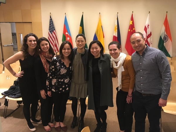 Mina Kim (center), PM Anchor and KQED Forum Friday host, graciously agrees to take a photo with some members of the ASNC Young Professionals Group. (Asia Society)