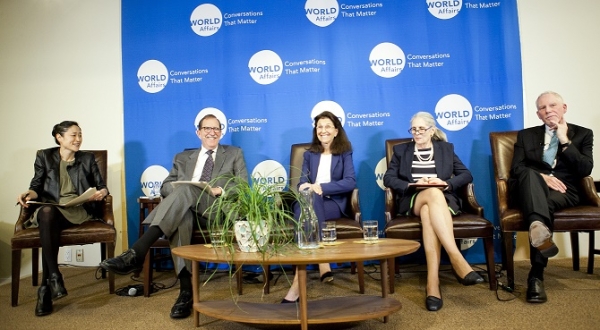 The panelists have a chuckle in the midst the discussion. (Whitney Legge/The Asia Foundation)