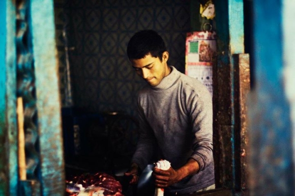 A butcher chops meat in a shop in Swayambunath. (Sai Abishek)