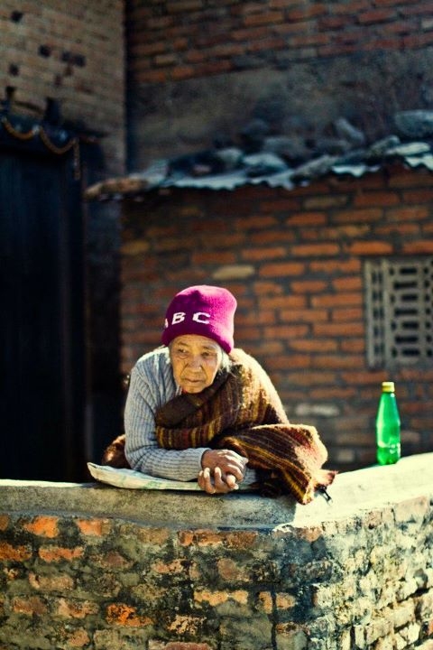 A woman rests in Kathmandu. (Sai Abishek)