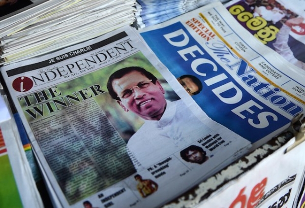  Newspapers for sale at a stall in Colombo on January 10, 2015, leading with headlines about Sri Lanka's new president Maithripala Sirisena. (Akruwan Wanniarachchi/AFP/Getty Images)