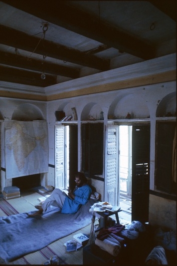 BENARES, INDIA - FEBRUARY 1963: Ginsberg  reading on his bed in his tenement apartment. (Pete Turner/Getty Images)