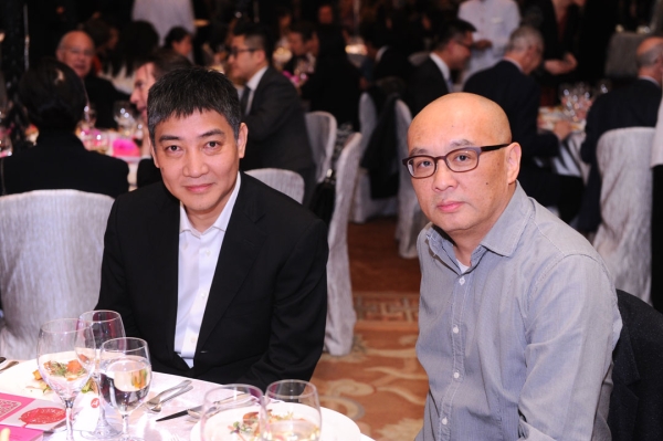 (Left to right) Leng Lin of Pace Gallery Beijing and artist Zhang Xiaogang at the 2015 gala.