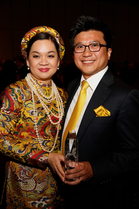 From left, Phuong Nguyen and 2015 Sports Visionary award winner Henry Nguyen, Managing Partner, IDG Ventures Vietnam and Managing Partner, Los Angeles Football Club pose during the 2015 Asia Society Southern California Annual Gala on Thursday, June 20, 2015, in Century City, Calif. (Photo by Ryan Miller/Capture Imaging)