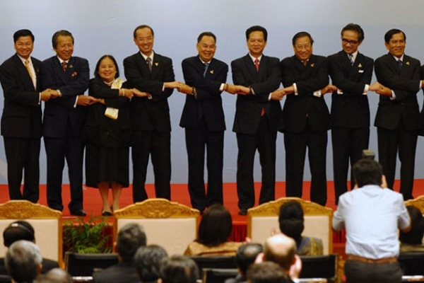 Foreign Ministers from the Association of Southeast Asian Nations (ASEAN) pose for a group picture with Vietnamese Prime Minister Nguyen Tan Dung at the opening of their 43rd annual meeting in Hanoi on July 20, 2010. (Hoang Dinh Nam/AFP/Getty Images)