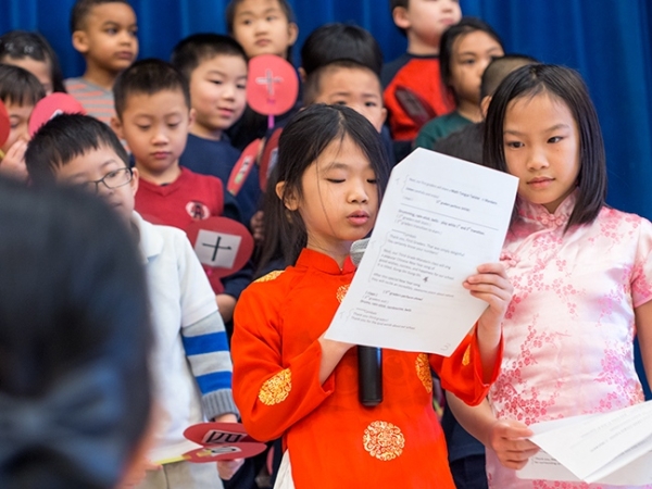 Mandarin Immersion students alternately speak in Chinese and English while moderating a Chinese New Year celebration and special assembly at Beacon Hill International School. 