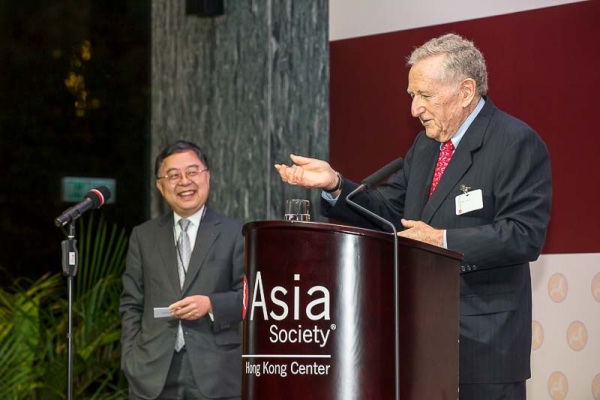 Ambassador Levin delivers a speech while ASHK Chair Ronnie Chan looks on.