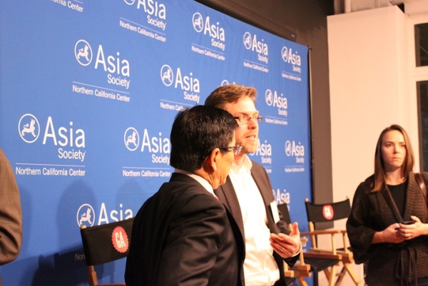 Birger Stamperdahl (center), President and CEO of Give2Asia, chats with an attendee after the event. (Asia Society)
