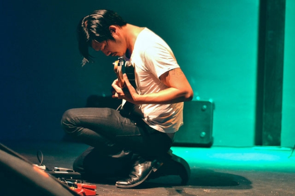 Alex Zhang Hungtai, also known as Dirty Beaches, onstage at Animal Social Club in Rome, Italy on October 19, 2011. (Flavia/Flickr)