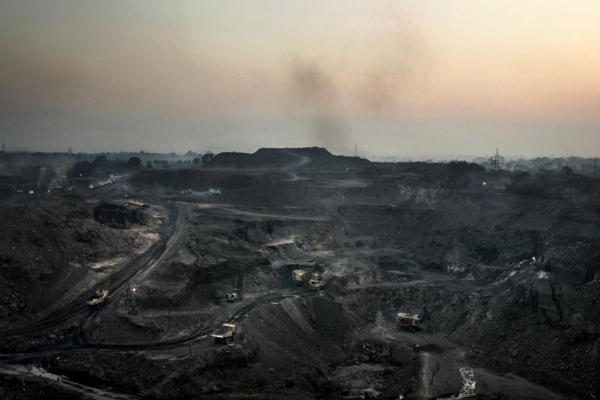 An open-air mine near Dhanbad runs 24 hours a day extracting coal. (Erik Messori)