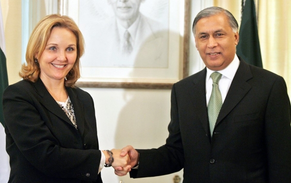 Pakistan's Prime Minister Shaukat Aziz (R) shakes hands with visiting U.S. Under Secretary of State for Economic, Business and Agricultural Affairs, Josette Sheeran prior to a meeting in Islamabad, 23 May 2006. (Aamir Qureshi/AFP/Getty Images)