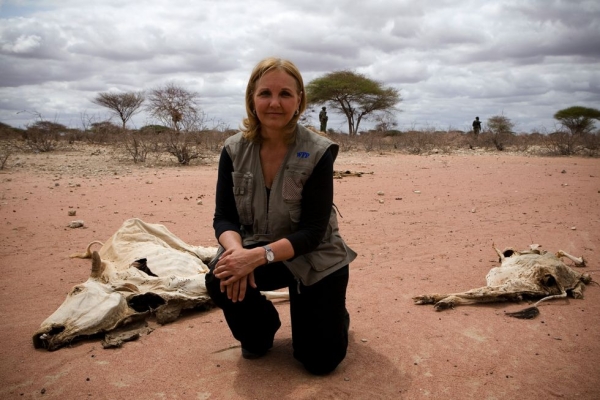 Josette Sheeran during an interview near carcasses of animals that died because of drought in Wajir, northeastern Kenya, on July 23, 2011. (WFP/Siegfried Modola)
