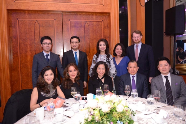 Asia Society Trustee Guoqing Chen (seated second from right) and guests.