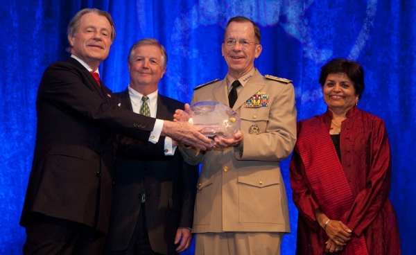 Admiral Mike Mullen, Chairman of the Joint Chiefs of Staff (3rd from left), receives the Public Policy Award on behalf of the U.S. Armed Forces. From L to R: Asia Society Washington Chairman Leo. A. Daly III and Lockheed VP for Global Security Policy Bill Inglee; and Asia Society President Vishakha N. Desai during Asia Society Washington&apos;s Annual Dinne, June 9, 2010, at the Ritz-Carlton in Washington DC. (Les Talusan/Asia Society)