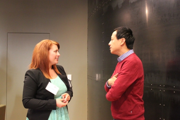 Makenna Martinez, ASNC Corporate Development Officer, speaks after the event with an attendee. (Asia Society)