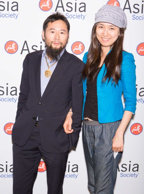 Stylish couple Liangang Sun and Dawei Wang at the Awards Dinner. (Bennet Cobliner)