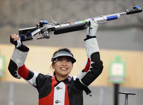 GOLD: China's Siling Yi celebrates winning the gold medal during the Women's 10m Air Rifle Shooting final on July 28, 2012. (Lars Baron/Getty Images)