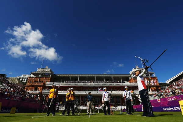 Japan's Ren Hayakawa takes aim during the Women's Team Archery Eliminations match between Britain and Russia on July 29, 2012 in London, England. (Paul Gilham/AFP/Getty Images)