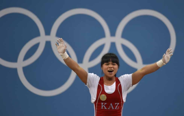 GOLD: Kazakhstan's Zulfiya Chinshanlo celebrates winning the Women's Weightlifting 53kg Group A on July 29, 2012. (Yuri Cortez/AFP/GettyImages)