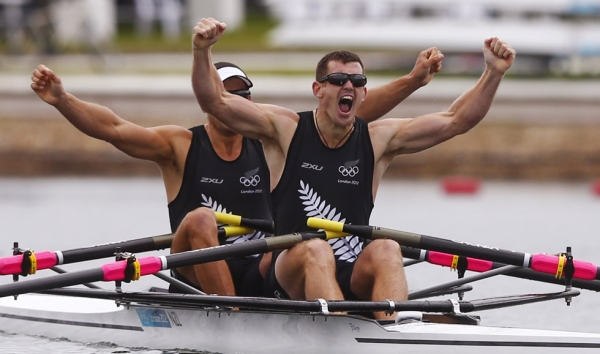GOLD: New Zealand's Nathan Cohen (L) and Joseph Sullivan celebrate after winning the gold medal in the men's double sculls final A of the rowing event on August 2, 2012. (Eddie Keogh/AFP/GettyImages)