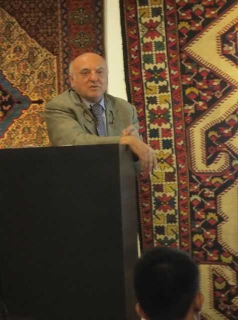 Chamuel Sameyeh delivers his lecture on appreciating oriental carpets