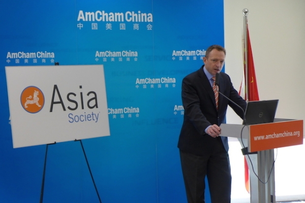 Mark Duval, President of the American Chamber of Commerce in China, delivers welcome remarks at the Beijing event to launch the report (Asia Society)