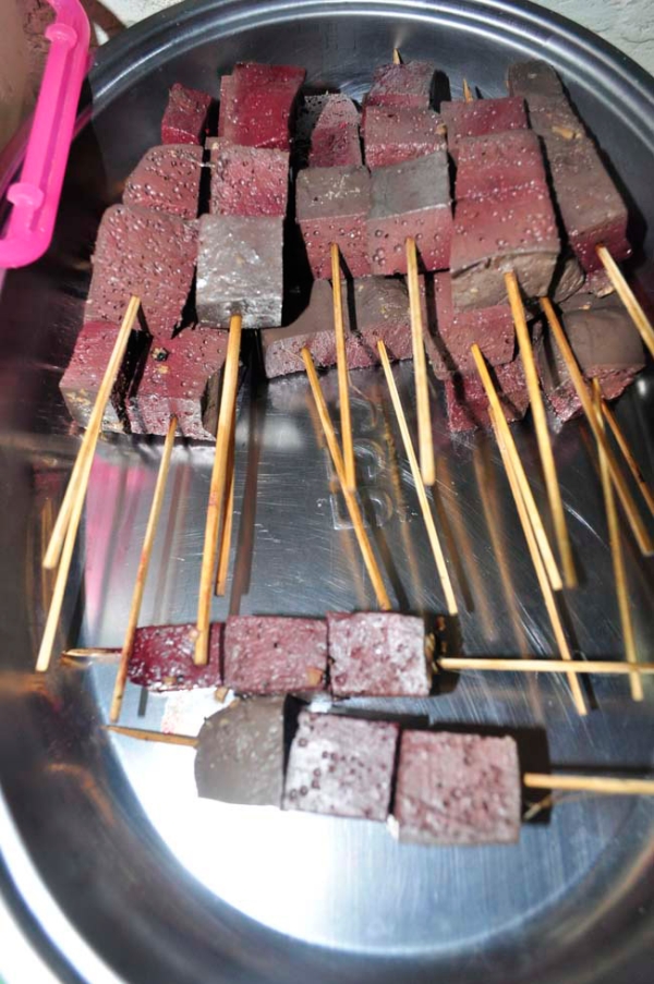 Betamax, skewered salted solidified pork or chicken blood, from the Philippines. (Ayie Zerrudo)