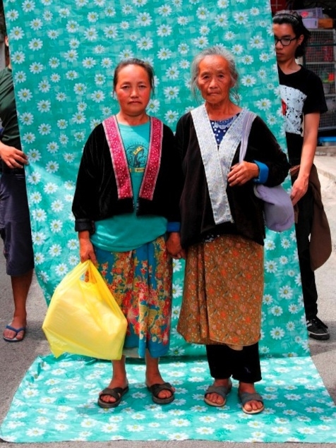 Two of Wasiksiri's subjects shopping at a street market in Chiang Mai (Lost at E Minor)