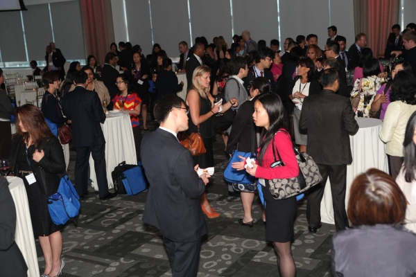 Delegates mingle during the Awards Ceremony cocktail reception