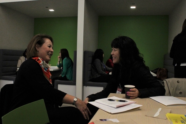 Kohara and Anna Mok, Partner at Deloitte, take the opportunity to catch up over coffee (Stesha Marcon).